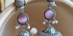 women silver replica peacock jhumka earrings