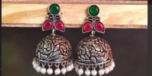 women traditional german silver jhumka earrings