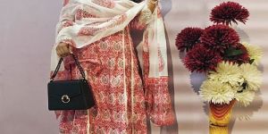 Ladies Red and Cream Printed Rayon Kurti Pant Set with Net Border