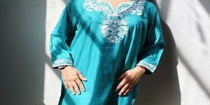Ladies Sky Blue Embroidered Rayon Short Kurti