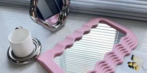 Pink Resin Wavy Wall Mirror