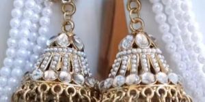 Women Elagant Pearl Beaded Jhumka Earrings with Kundan Detailing