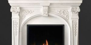 Ornate White Marble Fireplace with Arched Design