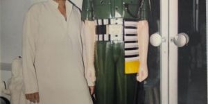 white marble standing sainik statue