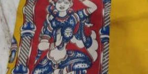 Traditional Yellow & Red Temple Kalamkari Saree with Golden Kaddi Border