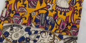 Vibrant Yellow Nellore Silk Saree with Traditional Kalamkari Village Art Print