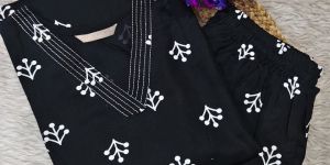 Trendy Black Rayon Kurti Pant Set with Attractive Prints