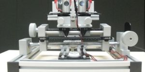 OPTICS MOUNTING SYSTEM