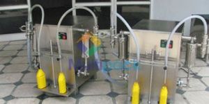 Two Head Semi Automatic Volumetric Liquid Filling Machine