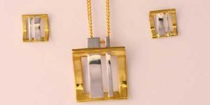 Trendsetting Pendant Set with Gold And Silver Finish