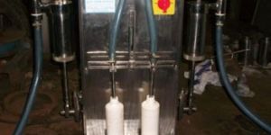 Semi Automatic Volumetric Liquid Filling Machine