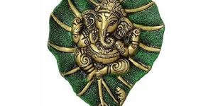 Ganesh On Golden & Green Leaf Statue