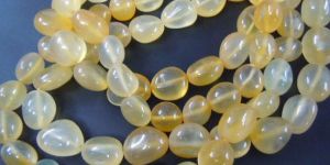 Yellow Chalcedony Plane Smooth Nuggets Tumble