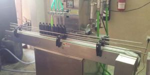 Four Head Filling Machine