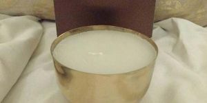 Brass Cup Candle with a White Marble Coaster