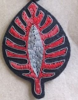 Red Leaf Badge