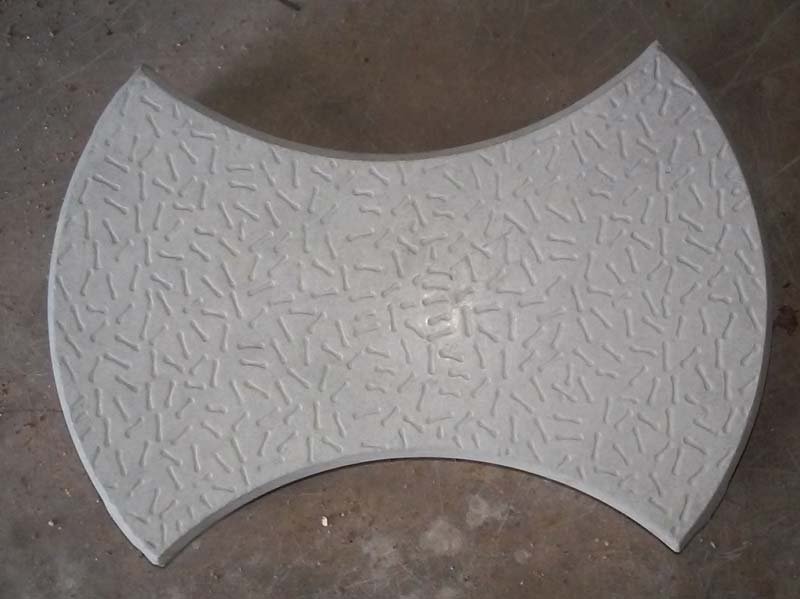 Damru Shaped Interlocking Concrete