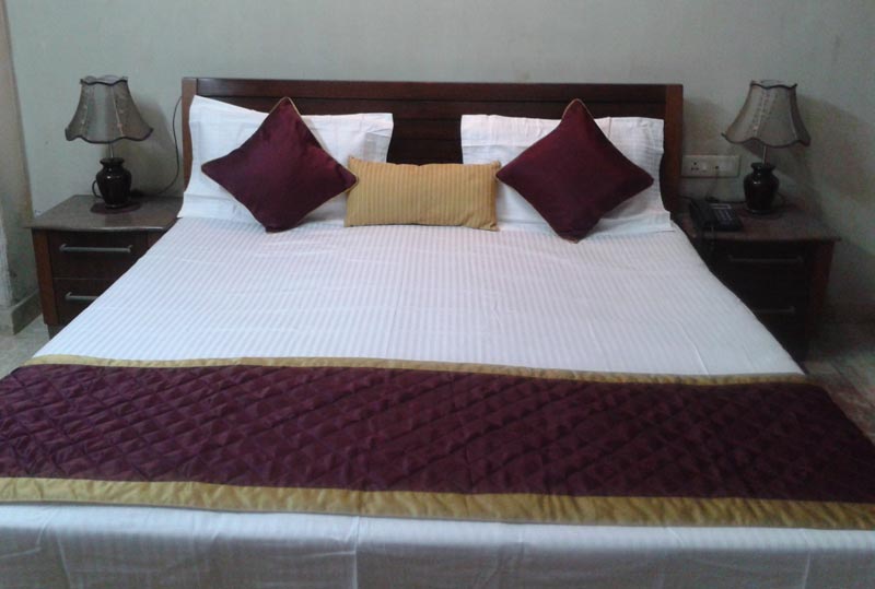 Silk fabric bed runner in cherry colour