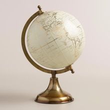 White Globe on Gold Stand