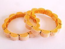 Floral Shape Pearl Bangle