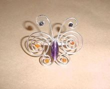 ALUMINIUM BUTTERFLY WIRE NAPKIN RING