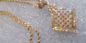 Sterling Silver Bracelets and Gold Diamond Pendants