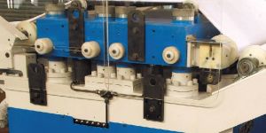 THROUGHFEED STACKING MACHINE