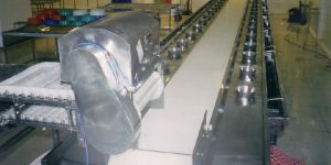De Heading Conveyor System