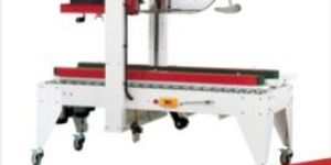 AUTO FLAP FOLDING AND SEALING M/C