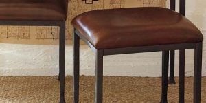 IRON WITH LEATHER UPHOLSTERED STOOLS