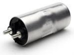 Capacitors with over-moulded connectors