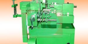 AUTOMATIC COUPLER DRILLING AND CUTTING MACHINE