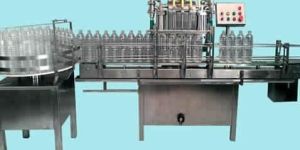 AUTOMATIC 4 HEAD BOTTLE FILLING MACHINE