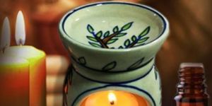 CERAMIC AROMA DIFFUSER WITH 6 PCS CANDLE AND 3 BTL OIL