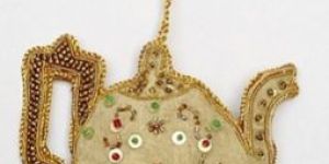 CATTLE SHAPE ORNAMENT