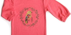 PINK TOP WITH GLITTER PRINT AND EMBROIDERY