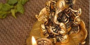 Handcrafted Ganesh Statues on Leaf with Diya