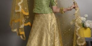 GREEN RAW SILK HEAVY HAND EMBROIDED LONG CROP TOP WITH BROCADE LEHENGAAND ORGANZA DUPPATTA
