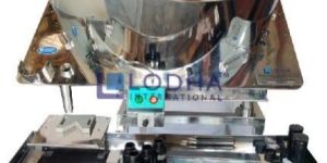 AUTOMATICE CAPSULE COUNTING AND FILLING MACHINE