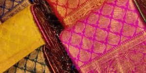 Monika Emboz Copper Zari Saree