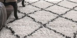 White & green saggy rugs