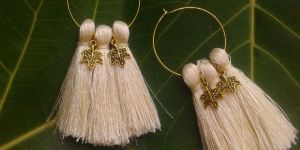 off-white earrings (fabric)