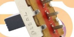 SS12F44G7 0.3A 30V SPDT 3 pin metal body panel mount plastic handle slide switch