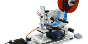 FLAT BOTTLE LABELING MACHINE