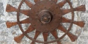 Wooden Wheel on Iron Stand