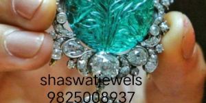 Carved Emerald Pendant