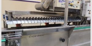 Linear Vibrating Filling machine for gherkin in Glass jar and Tin Can.