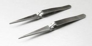 Cross Action Tweezers