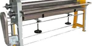 AUTOMATIC SHEET PASTING MACHINE