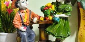 Polyresin Multicolor Fruit Table Baby Couple Statue
